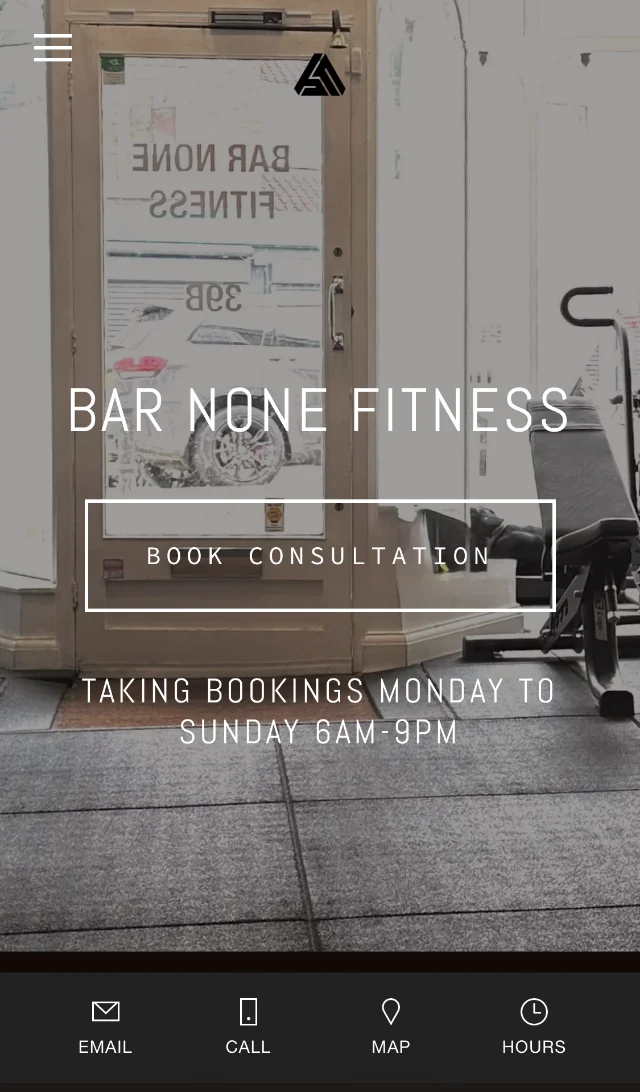 The Bar None Fitness website on a phone